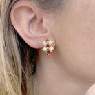 Boucles d'oreilles CHAUMET en or jaune, rubis et diamants - Castafiore