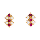 Boucles d'oreilles CHAUMET en or jaune, rubis et diamants - Castafiore