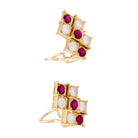 Boucles d'oreilles CHAUMET en or jaune, rubis et diamants - Castafiore