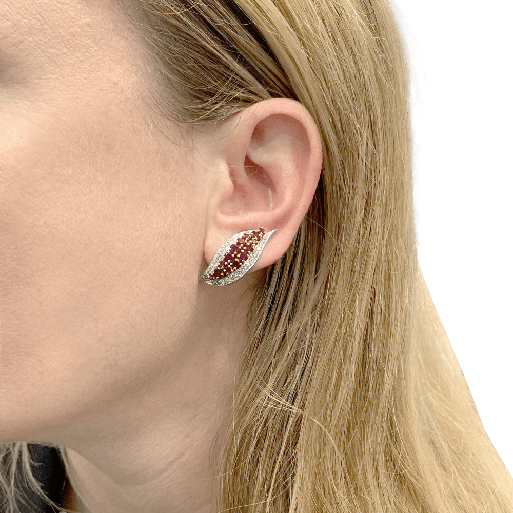 Earrings paltinium, yellow gold, rubies and diamonds.