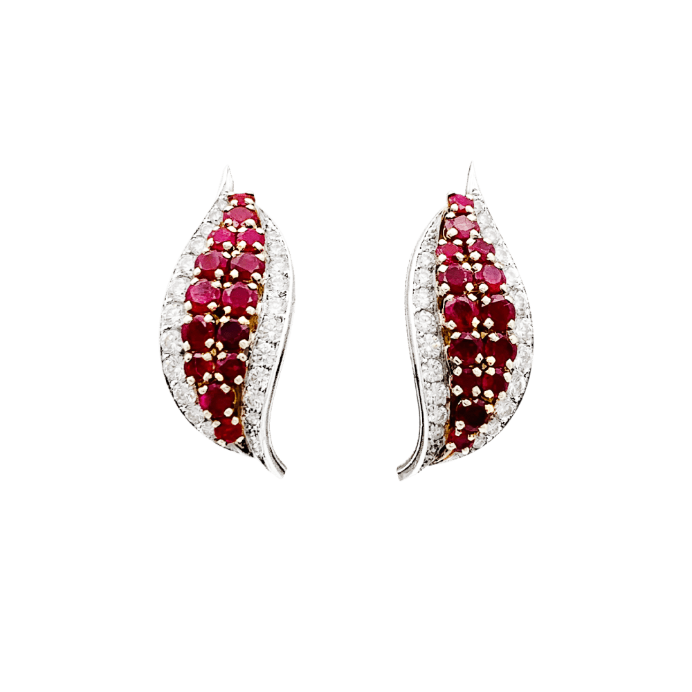 Earrings paltinium, yellow gold, rubies and diamonds.