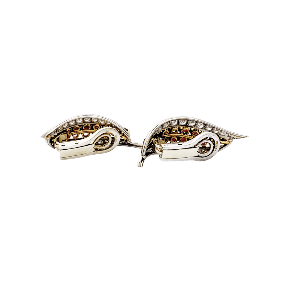 Earrings paltinium, yellow gold, rubies and diamonds.