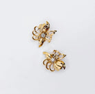 Boucles d'oreilles clips fleur diamants en or jaune et platine - Castafiore