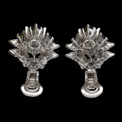 Boucles d'oreilles clips Piaget de 1978 en platine avec saphirs et diamants. Attestation Piaget. - Castafiore
