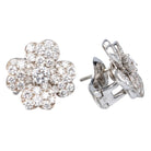 Boucles d'oreilles Cosmos de Van Cleef & Arpels en or et diamants