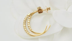 Boucles d'oreilles créoles en or jaune et diamants - Castafiore