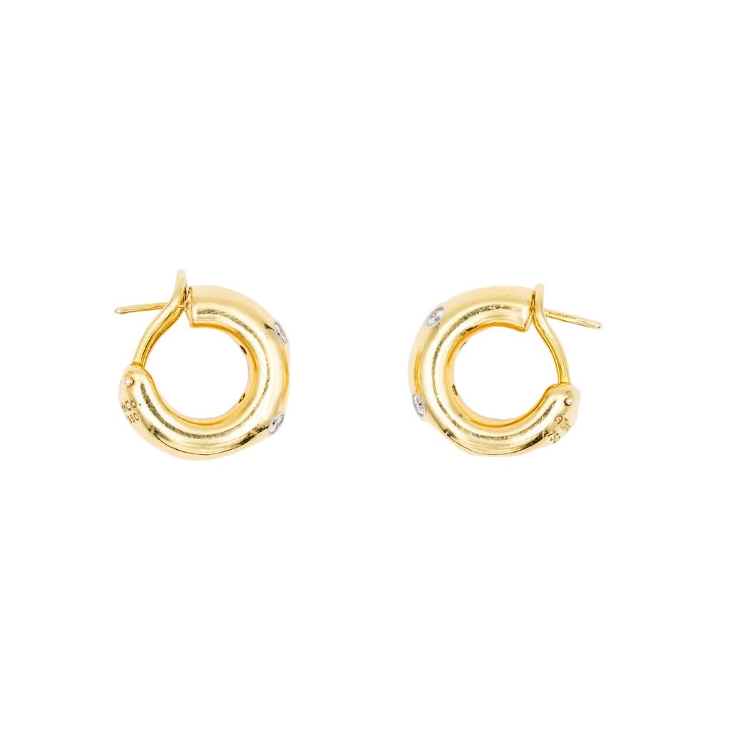 Boucles d'oreilles Créoles TIFFANY & CO. "Etoiles" en or jaune, platine et diamants - Castafiore
