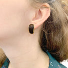 Boucles d'oreilles Dormeuses BOUCHERON vintage en or jaune et bois - Castafiore