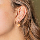 Boucles d'oreilles Dormeuses POMELLATO "Nudo" en or rose et quartz - Castafiore