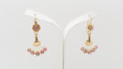 Boucles d'oreilles en or jaune et rubis