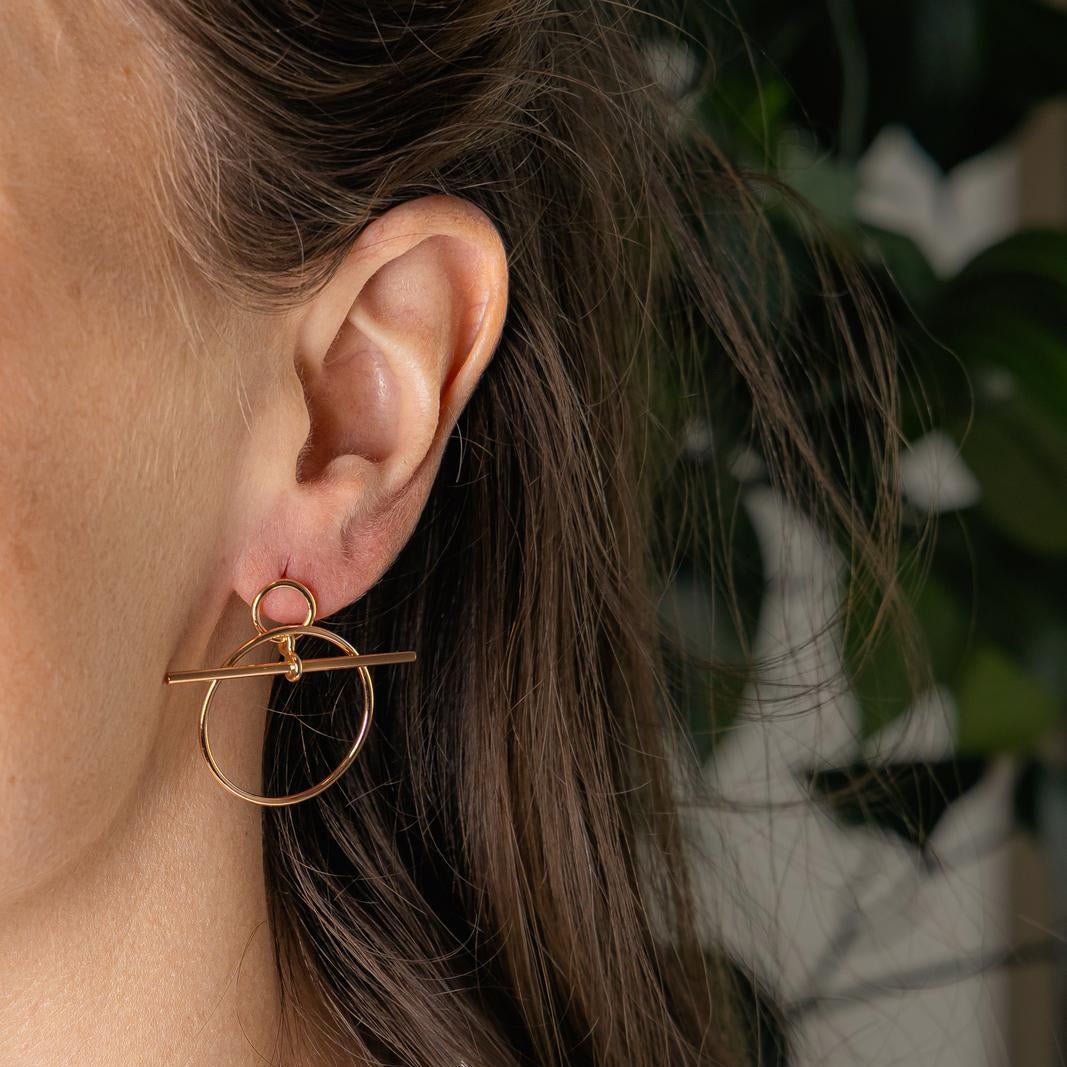 Boucles d'oreilles HERMÈS "Loop" en or rose - Castafiore