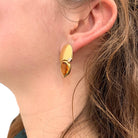 Boucles d'oreilles modernistes, or jaune, diamants, citrines. - Castafiore