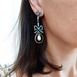 Boucles d'oreilles noeuds en argent et diamants - Castafiore