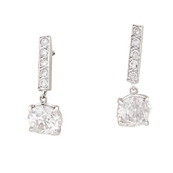 Boucles d'oreilles or blanc, diamants. - Castafiore