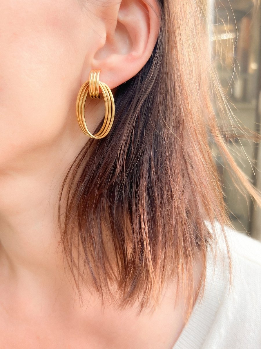 Boucles d'oreilles or jaune anneaux entrelacés - Castafiore