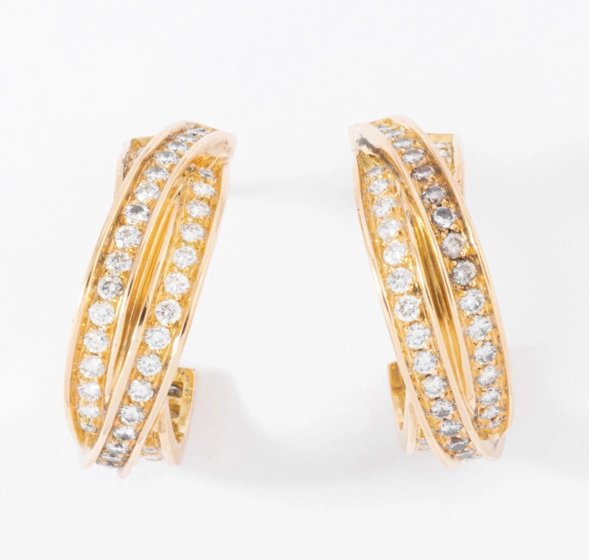Boucles d'oreilles or jaune et diamant de la maison Cartier modèle Trinity - Castafiore