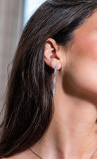 Boucles d'oreilles Pendantes DINH VAN "Seventies" en or blanc et diamants - Castafiore