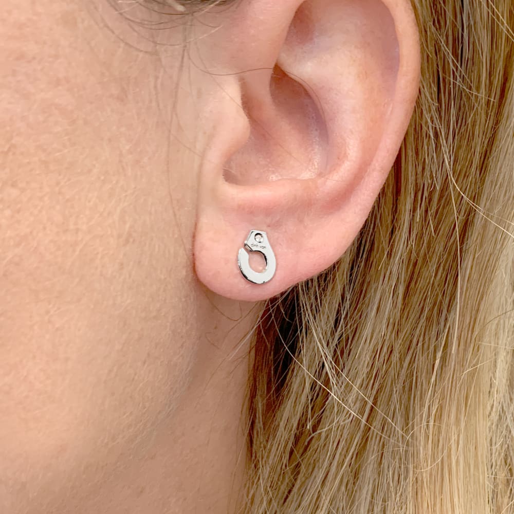 Dinh Van earrings, "Handcuffs white gold and diamonds.