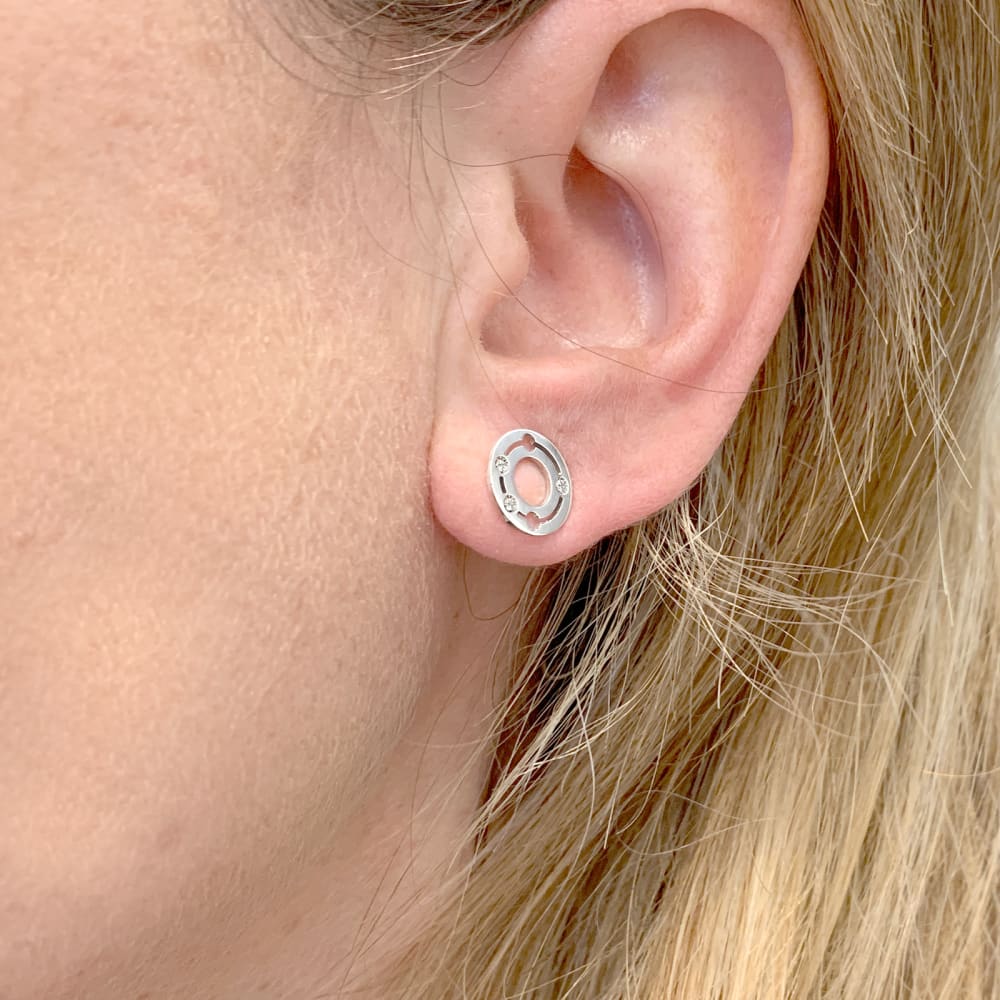 Dinh Van earrings, "Pulse", white gold and diamonds.