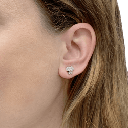 Earrings, paltinium and diamonds.