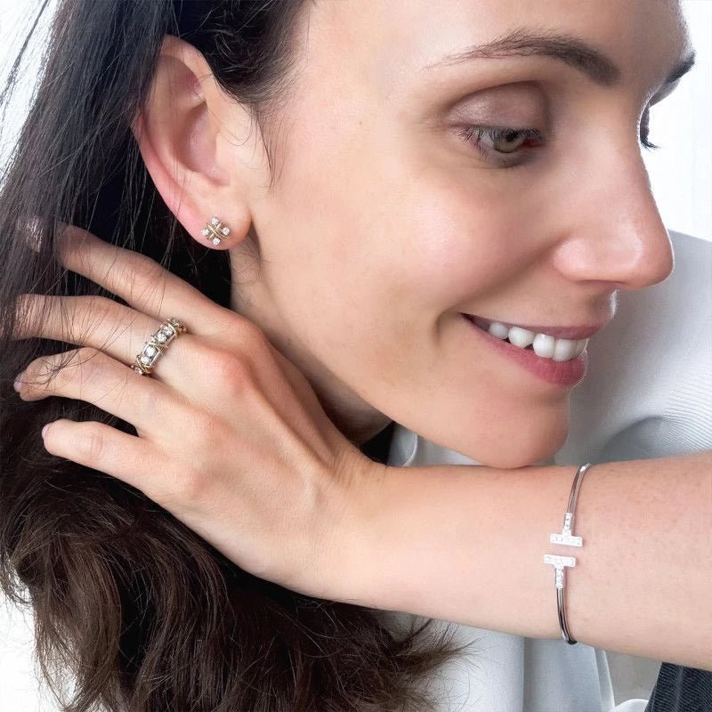 Boucles d'oreilles Puces TIFFANY & CO. "Sixteen Stone" en or jaune, platine et diamants - Castafiore