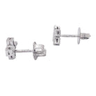 Boucles d'oreilles TIFFANY & CO., "Croix" en platine et diamants - Castafiore