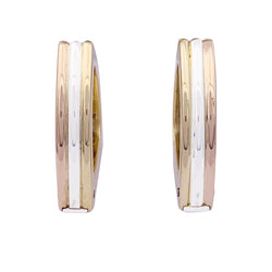 Boutons de manchette Cartier, trois ors. - Castafiore