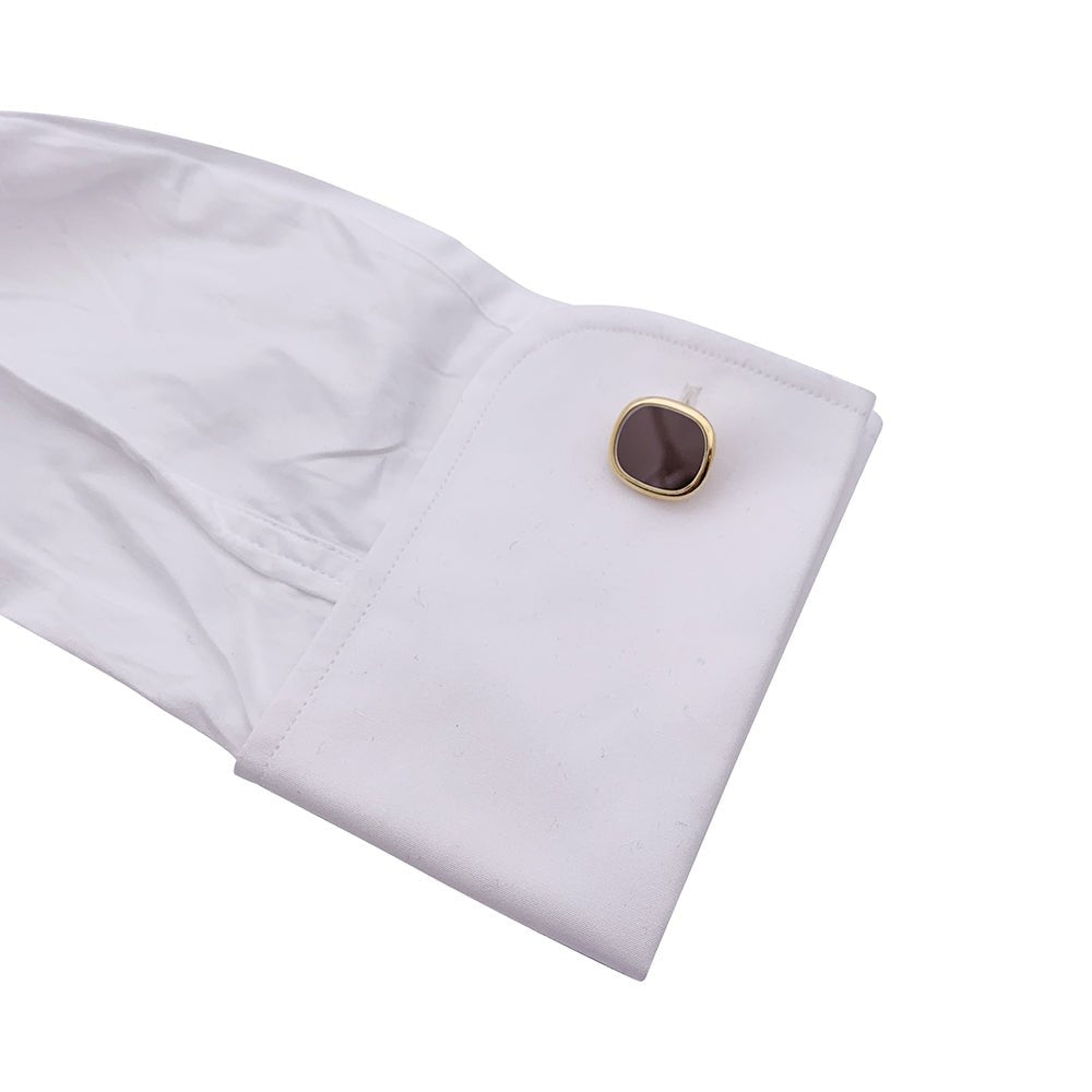 Boutons de manchette Patek Philippe or jaune, laque "Ellipse". - Castafiore