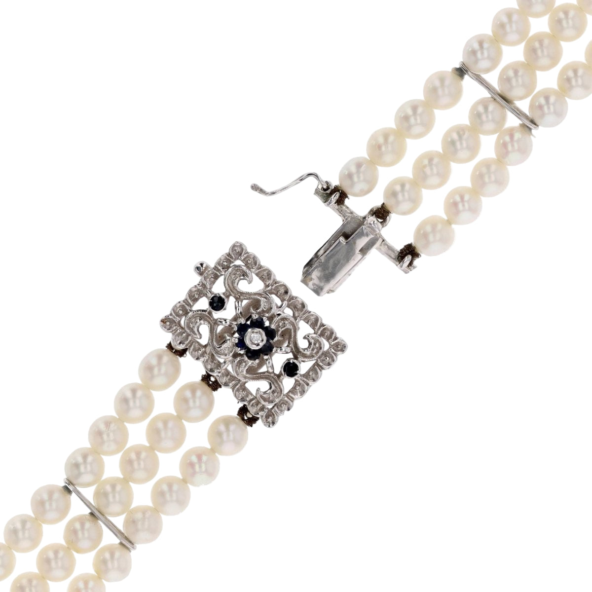 Bracelet 3 rangs de perles et son fermoir en or blanc - Castafiore