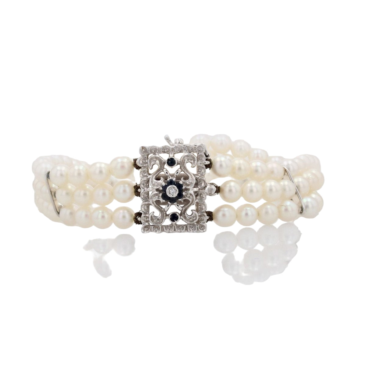 Bracelet 3 rangs de perles et son fermoir en or blanc - Castafiore