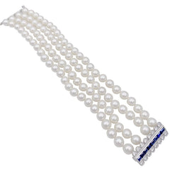 Bracelet 4 rangs de perles, fermoir or blanc, saphirs et diamants. - Castafiore