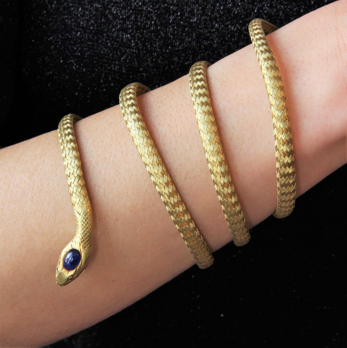 Bracelet ancien en or serpent et saphir cabochon - Castafiore