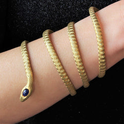 Bracelet ancien en or serpent et saphir cabochon - Castafiore