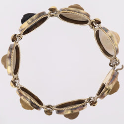 Bracelet former ruddy and cameos lava stones