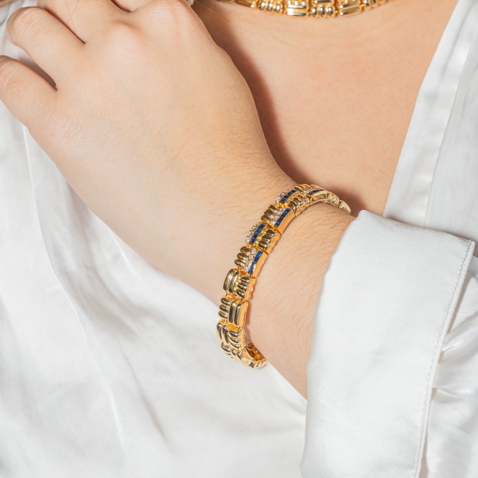 Bracelet BOUCHERON en or jaune, saphir et diamants - Castafiore