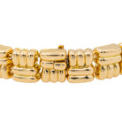 Bracelet BOUCHERON en or jaune, saphir et diamants - Castafiore