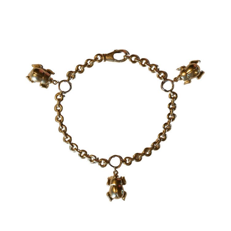 Bracelet Breloque CARTIER "Scarab" en or jaune - Castafiore