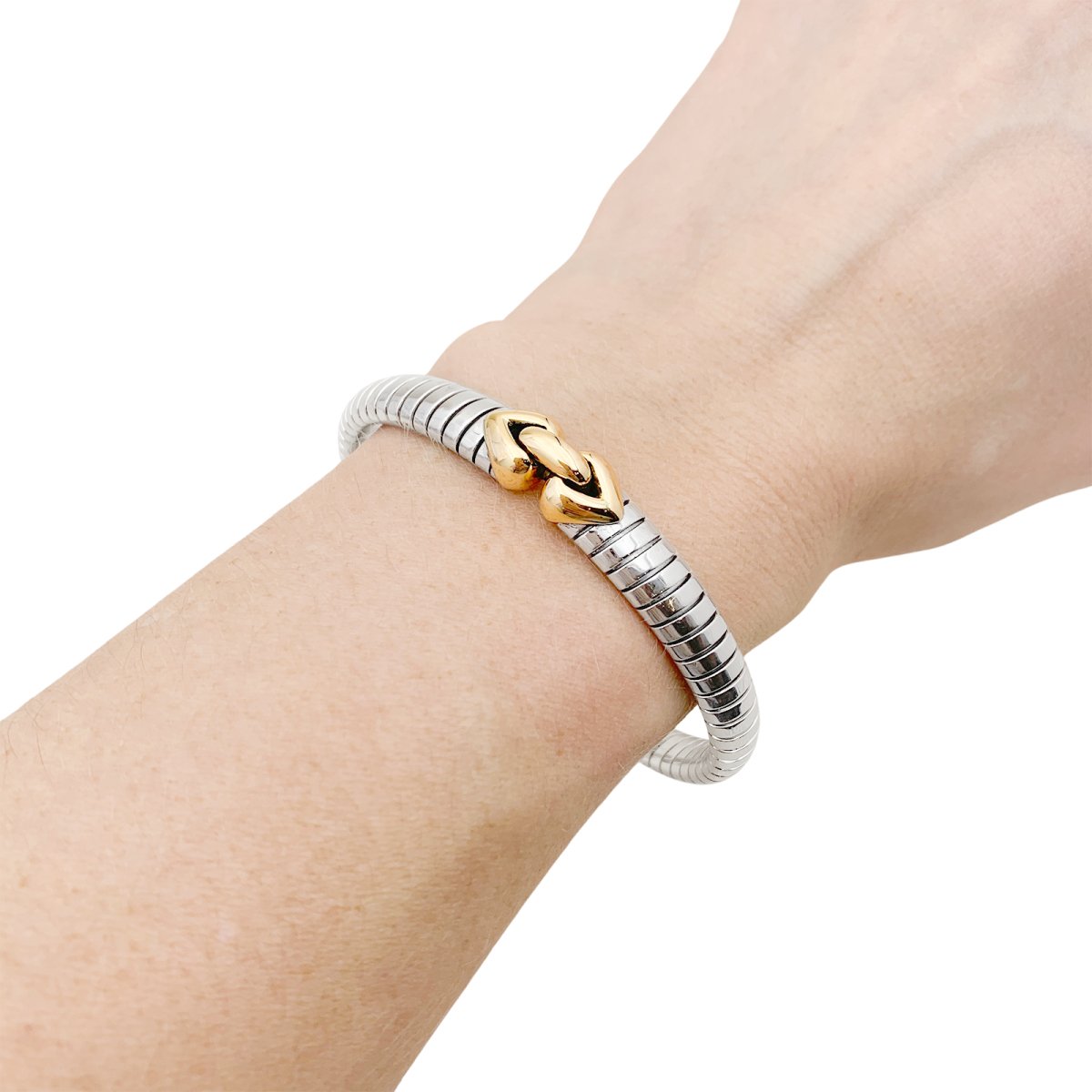 Bracelet Bulgari, "Doppio Cuore", or et acier. - Castafiore