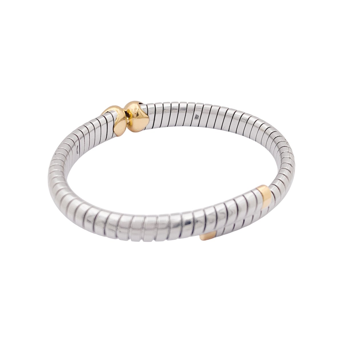 Bracelet Bulgari, "Doppio Cuore", or et acier. - Castafiore