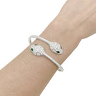 Bracelet BULGARI "Serpenti Seduttori" en or blanc, émeraudes et diamants - Castafiore