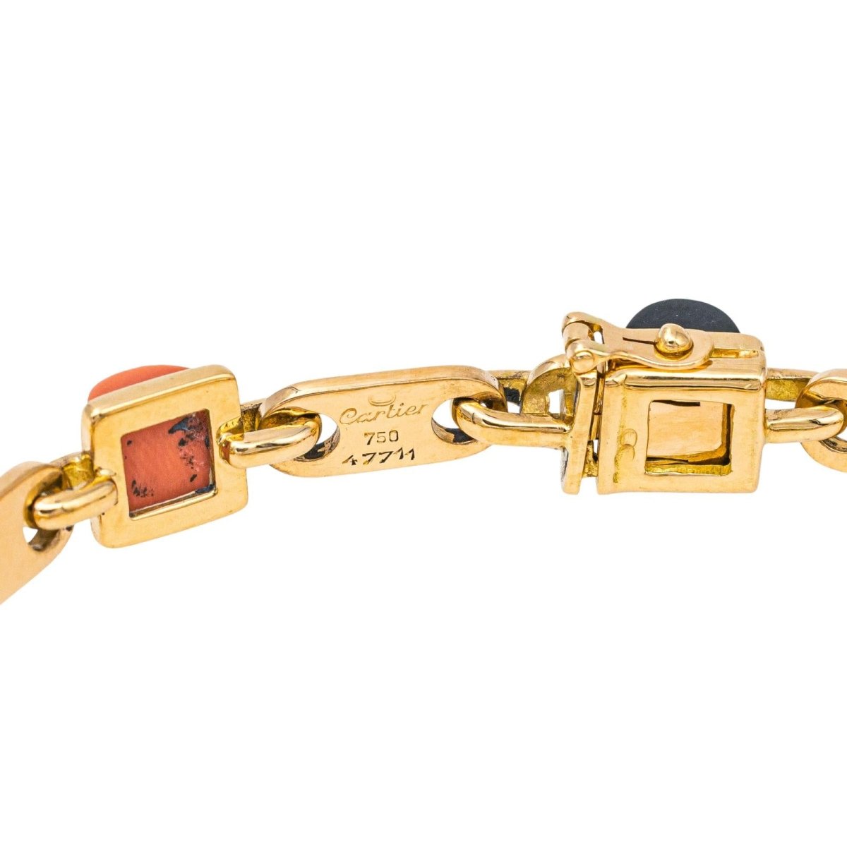 Bracelet CARTIER en or jaune, onyx et corail - Castafiore