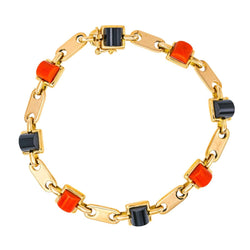 Bracelet CARTIER en or jaune, onyx et corail - Castafiore