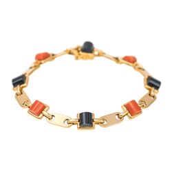 Bracelet CARTIER en or jaune, onyx et corail - Castafiore