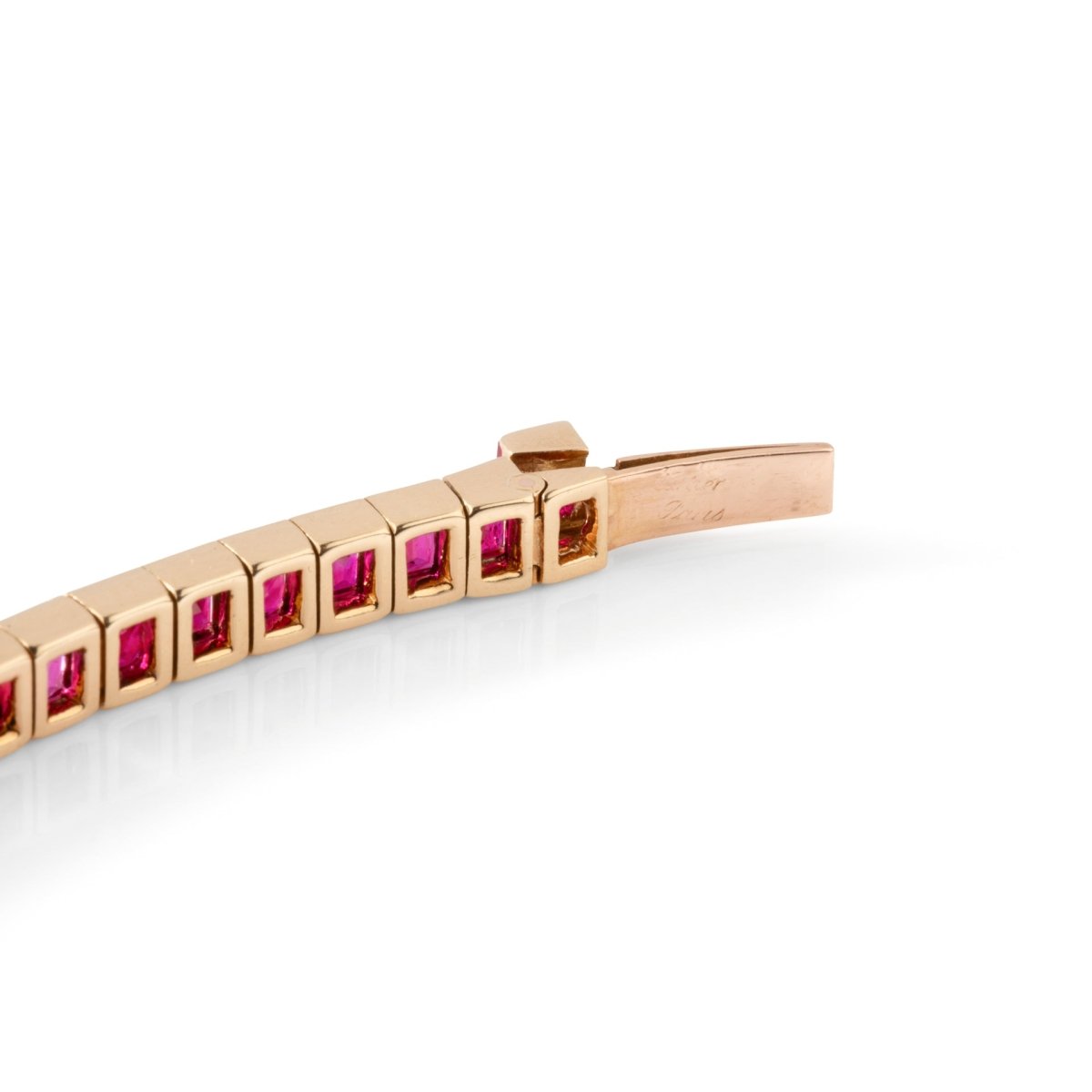 Bracelet CARTIER Ligne tennis en or jaune et rubis - Castafiore
