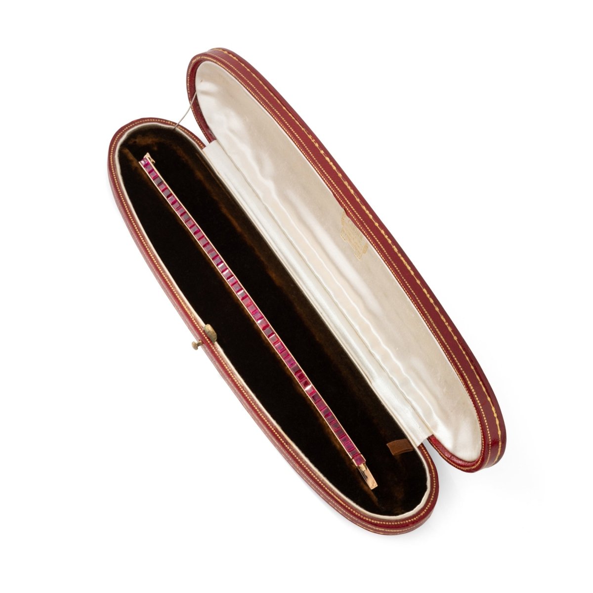 Bracelet CARTIER Ligne tennis en or jaune et rubis - Castafiore