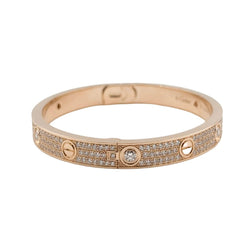 Bracelet CARTIER Love Classique en or rose et diamants