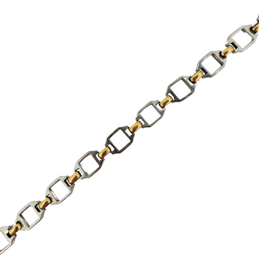 CARTIER “Santos” bracelet in yellow gold and steel