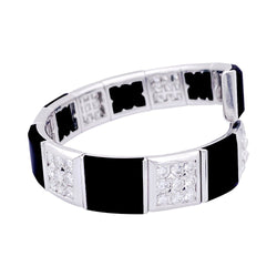 Bracelet CHANEL, "Harmonie", or blanc, diamants et onyx - Castafiore