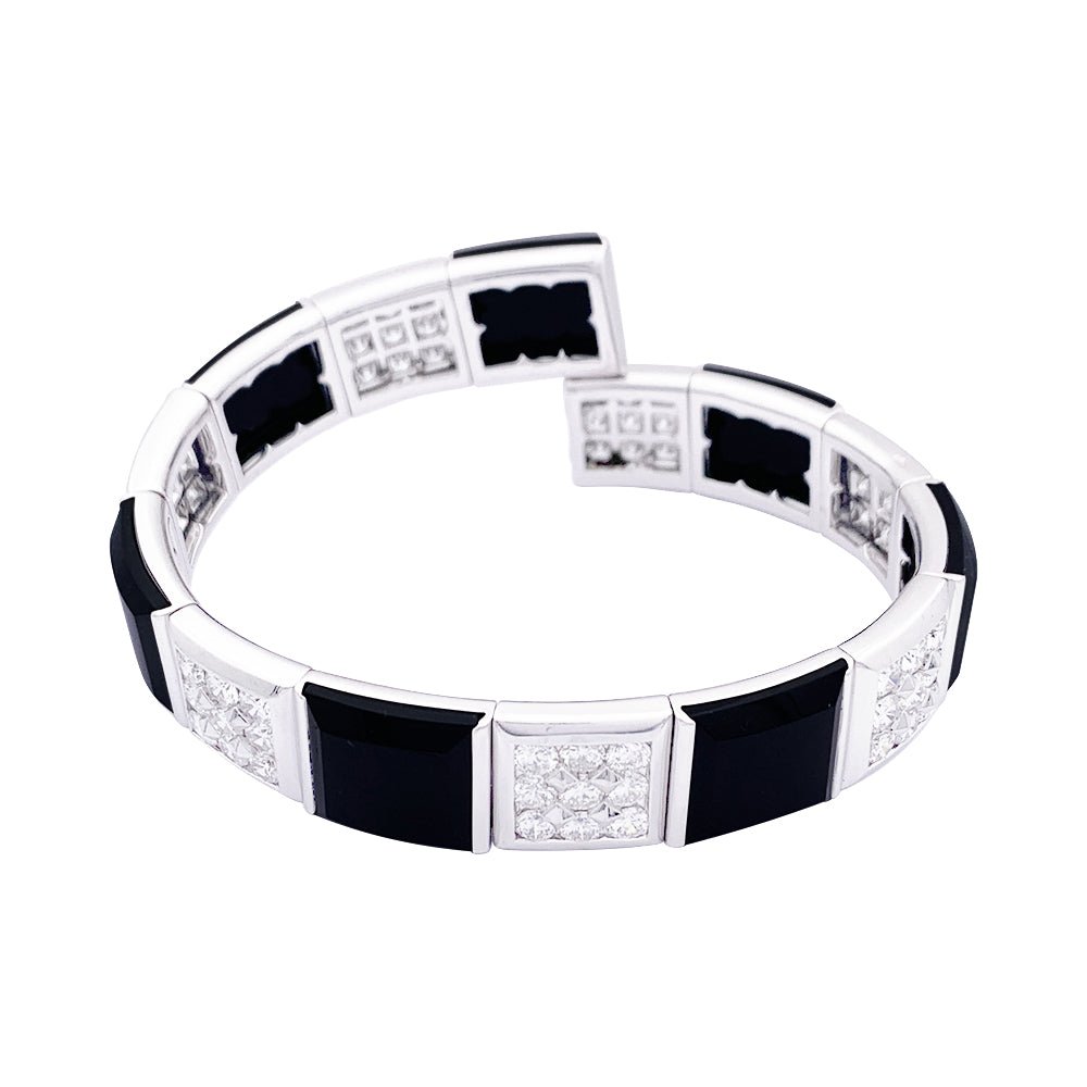 Bracelet CHANEL, "Harmonie", or blanc, diamants et onyx - Castafiore