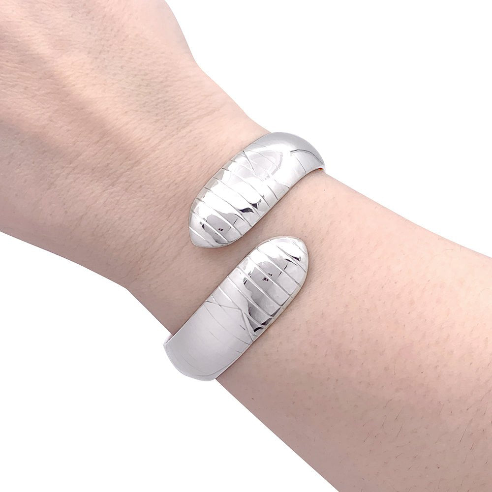 Bracelet Chaumet "Plume" or blanc. - Castafiore